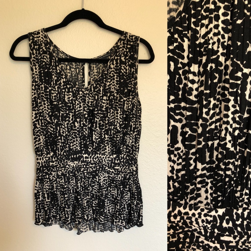 Peplum sleeveless top